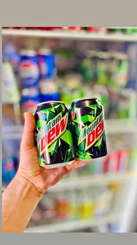 مشروب غازي - ماونتن ديو (Mountain Dew)