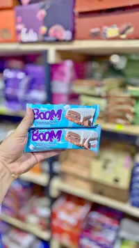 كيك مغطى بالشوكولاتة مع جوز الهند والمارشميلو - بوم (Boom)