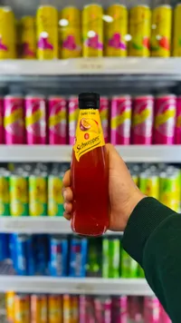 مشروب غازي بنكهة الفواكه الاستوائية - شويبس (Schweppes)