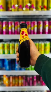 مشروب غازي بنكهة العنب - شويبس (Schweppes)