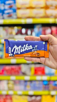 شوكولاتة بالحليب محشوة بالكراميل - ميلكا (Milka)