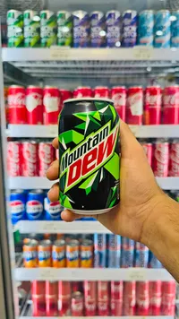 مشروب غازي - ماونتن ديو (Mountain Dew)