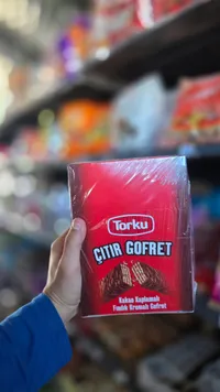 ويفر مقرمش مغطى بالكاكاو ومحشو بكريمة البندق - توركو (Torku)