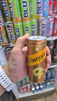 مشروب غازي بنكهة الأناناس الذهبي - شويبس (Schweppes)