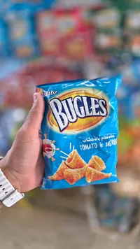سناكس الذرة المقرمشة بطعم الطماطم والأعشاب - بيجلز (Bugles)