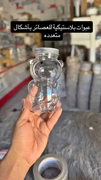 عبوة بلاستيكية للعصائر بتصميم دب