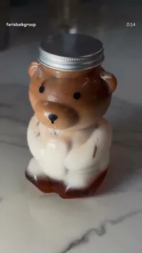 برطمان عسل على شكل دب