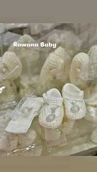 طقم حذاء وعصابة رأس للمواليد - روانا بيبي (Rawana Baby)