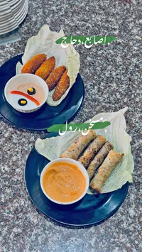 طبق أصابع الدجاج ومسخن الرول