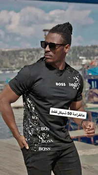 تيشيرت رجالي أسود بنقشة بقع بيضاء - بوس (Boss) - سوق غزة