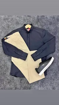 قميص رجالي كحلي وبنطلون بيج (Lacoste)