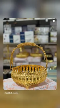 سلة ذهبية فاخرة مزخرفة بيد