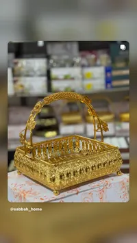 سلة ذهبية زخرفية بيضاوية الشكل
