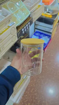 علبة زجاج لحفظ الطعام مع غطاء أصفر
