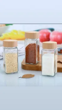 طقم مرطبانات توابل زجاجية بغطاء خشبي