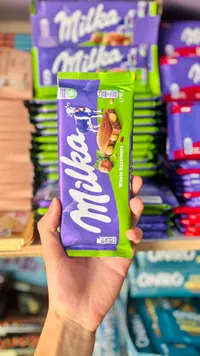 شوكولاتة بالحليب مع البندق الكامل - ميلكا (Milka)