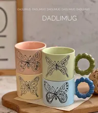 مج سيراميك بتصميم الفراشة - دادليمج (Dadlimug)