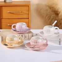 طقم أكواب وصحون مزين باللؤلؤ