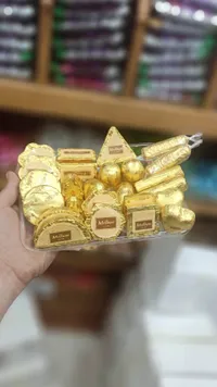 علبة شوكولاتة ذهبية ملبن فاخرة