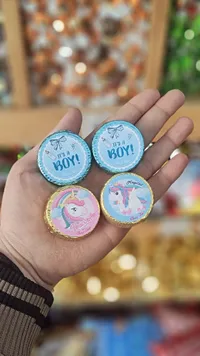 قطع شكولاتة بتصاميم احتفالية - It's a Boy و Unicorn