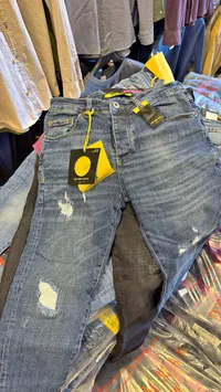 بنطال جينز رجالي ممزق - دينيم مان (Denim Man)
