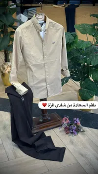 طقم قميص بيج وبنطال أسود - لاكوست (Lacoste)