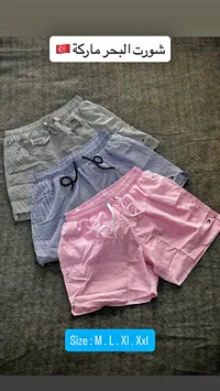 شورت بحر رجالي ماركة - تومي هيلفيغر (Tommy Hilfiger)