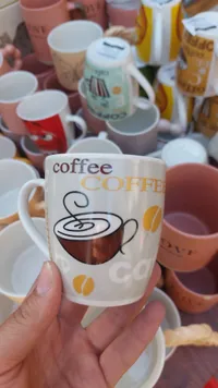 مج سيراميك بتصميم القهوة