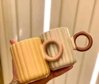 طقم أكواب سيراميك بتصميم مضلع ومقبض دائري