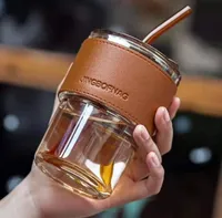كوب زجاجي مع غطاء جلدي وماصة - جينجبوفناج (Jingbofnag)