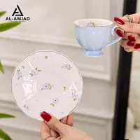 طقم فنجان وصحن - الأمجاد