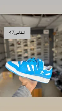 حذاء أديداس فوروم - أزرق وأبيض