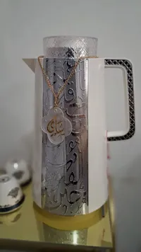 إبريق قهوة عربية فاخر بتصميم فضي وأسود