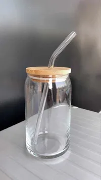 مرتبان زجاجي مع غطاء خشبي وماصة