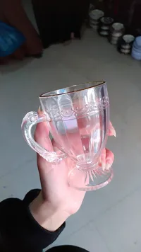 كوب زجاجي بيد - تصميم ملكي