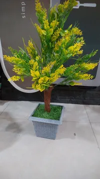 نبتة زينة صناعية - أزهار صفراء