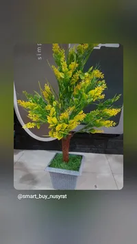 نبتة زينة صناعية بأزهار صفراء