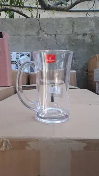 كوب زجاجي شفاف بمقبض