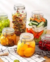 مرطبان زجاجي محكم الإغلاق بمشبك معدني