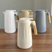 ترمس حافظ للحرارة بتصميم عصري ومقبض خشبي