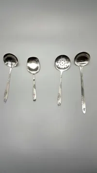 طقم ملاعق ومغارف تقديم من الستانلس ستيل