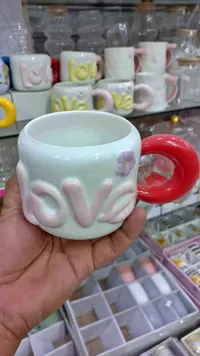 كوب سيراميك بتصميم كلمة الحب