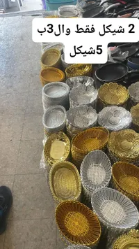 سلات بلاستيكية ملونة متعددة الأحجام