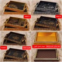 صواني ضيافة فاخرة - تصميم ذهبي وأسود