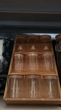مجموعة علب زجاج بحامل خشبي