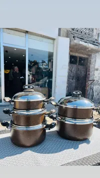 طقم طناجر جرانيت بغطاء معدني