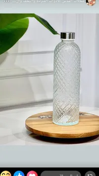 زجاجة ماء زجاجية بنمط ماسي