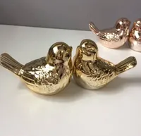 طقم عصافير زينة ذهبي
