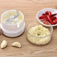 فرامة ثوم وخضروات يدوية صغيرة