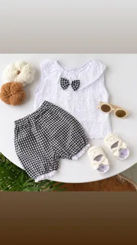 تشكيلة ملابس أطفال - فستان وشورت كاروهات